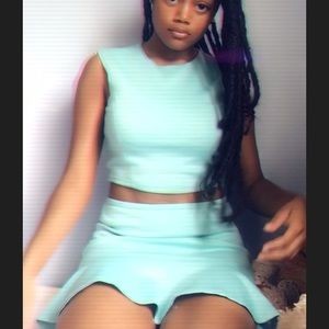 Teal two piece very cute worn once no stains, rips
